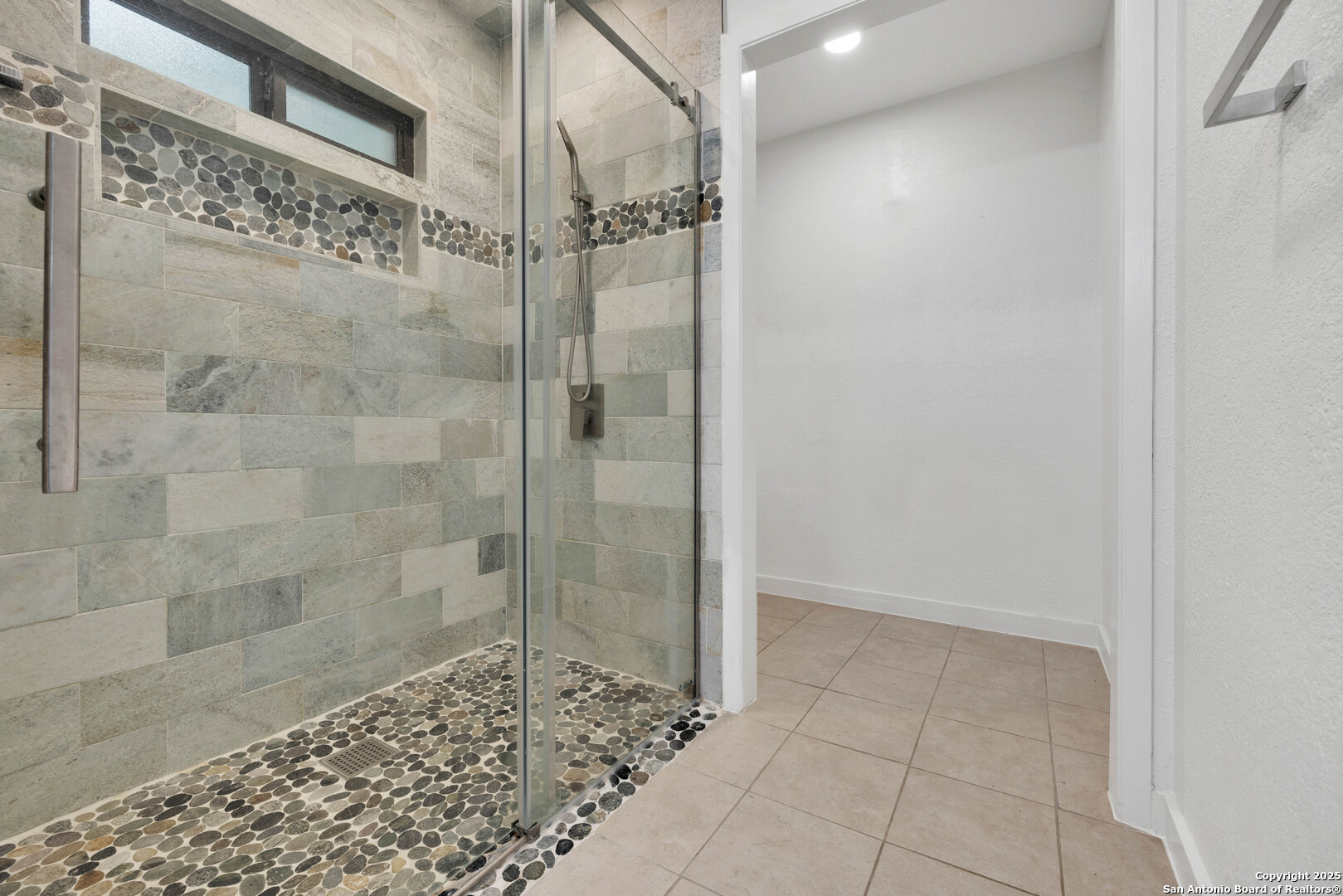11361 Moonsail Helotes, TX 78023 - Photo 23 of 27 a bathroom with a shower