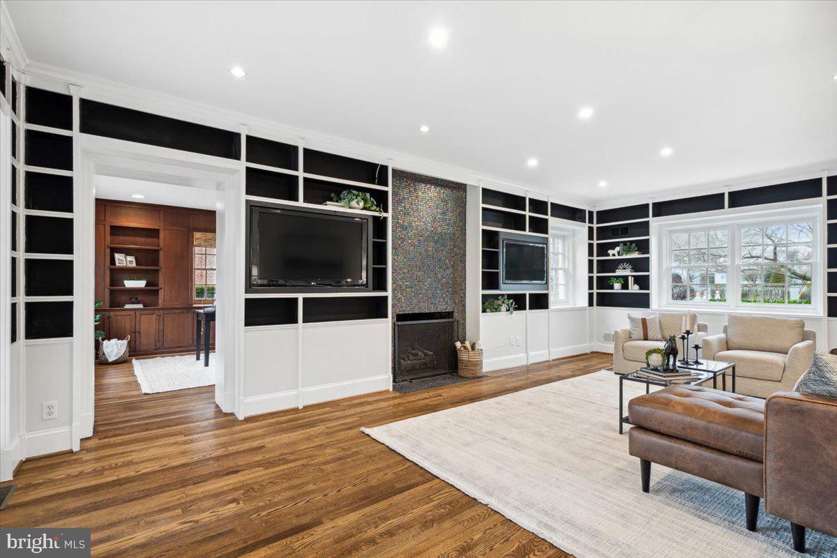 900 Rosemont Avenue Frederick, MD 21701 - Photo 7 of 62 Gas Fireplace flanked by shelving