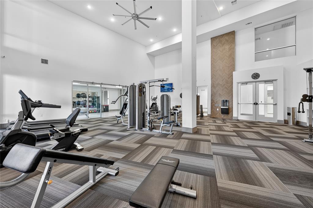 2700 Old Denton Road, Unit 2259 Carrollton, TX 75007 - Photo 37 of 39 a view of a room with gym equipment