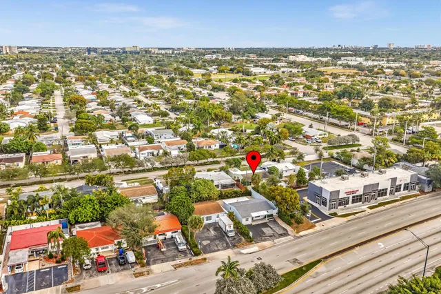 an aerial view of residential building and street