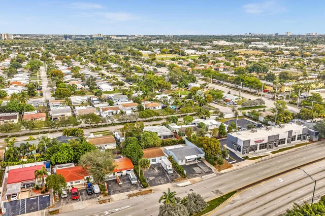 an aerial view of residential building and parking space