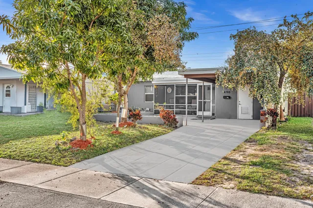 a front view of a house with entertaining space