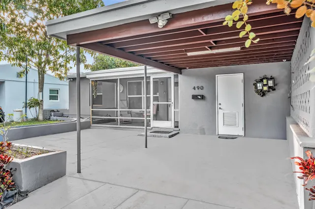 a view of pool with seating space