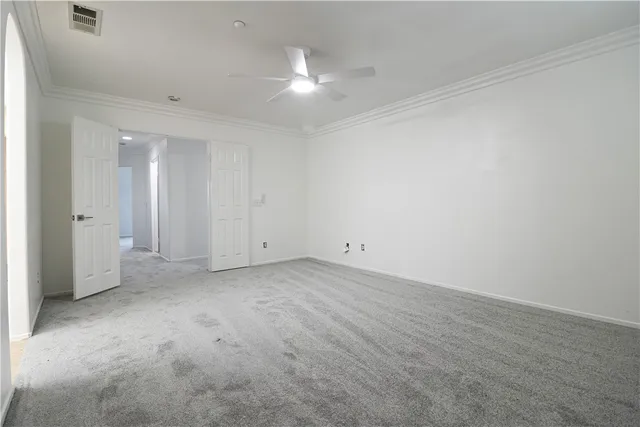 a bathroom with a toilet a sink and window