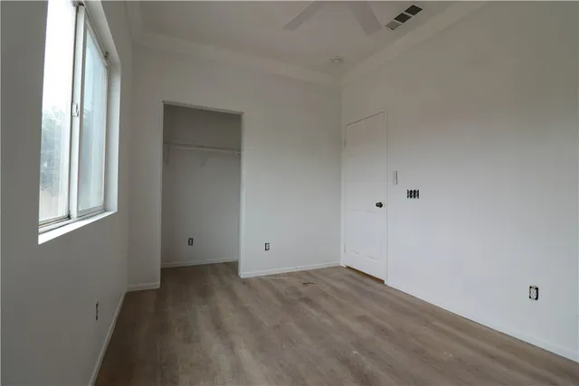 a utility room with cabinets washer and dryer