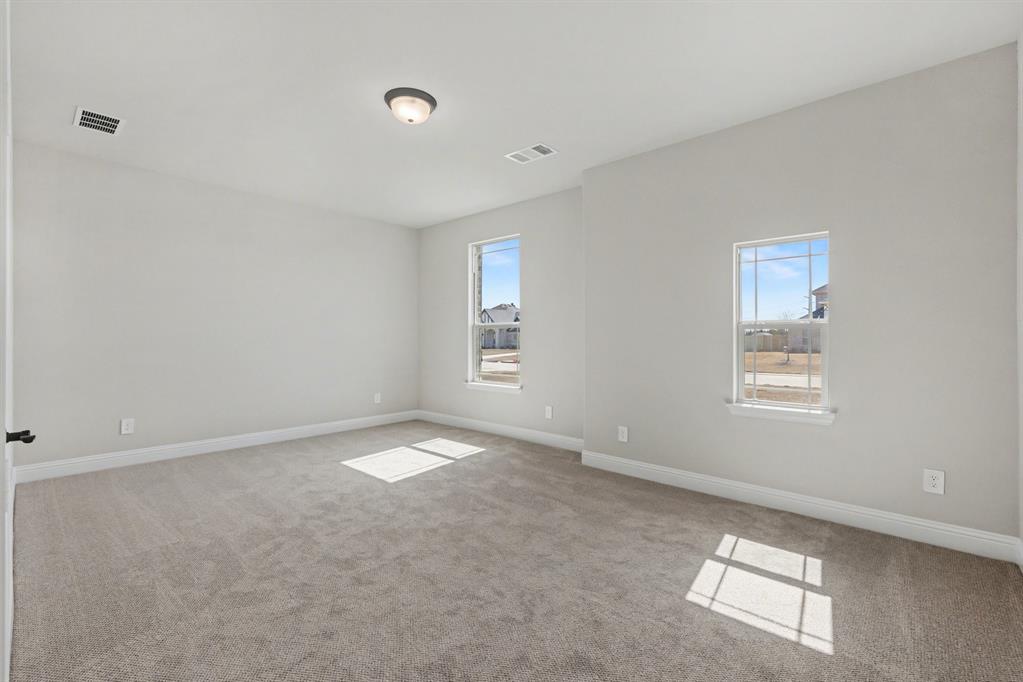 7041 Champion Road Midlothian, TX 76065 - Photo 20 of 30 a view of an empty room and a window
