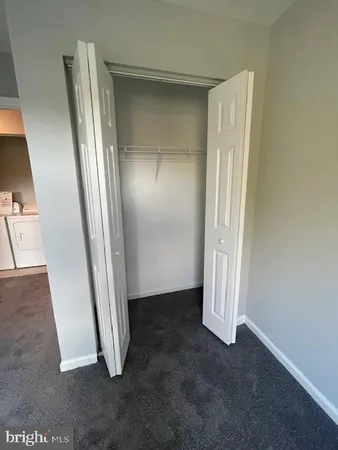 an empty room with a gallery