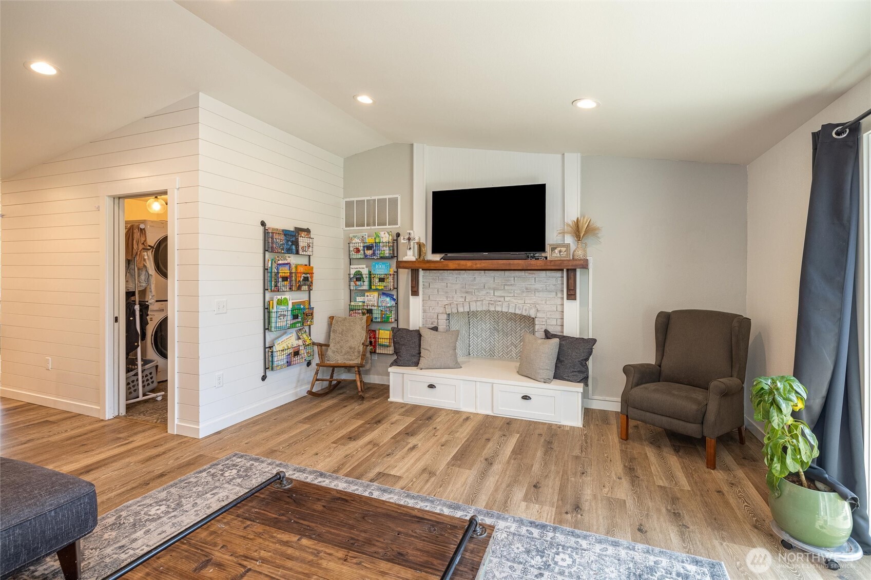 8679 Depot Road Lynden, WA 98264 - Photo 14 of 40 a living room with furniture and a flat screen tv