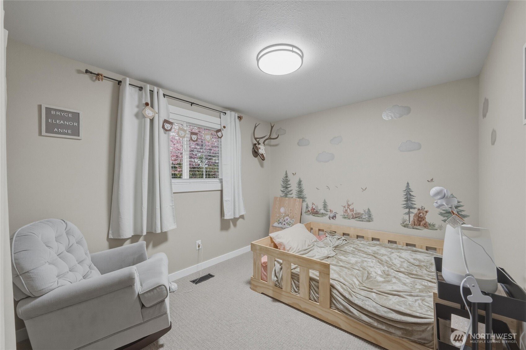 8679 Depot Road Lynden, WA 98264 - Photo 18 of 40 a room with a bed and a couch