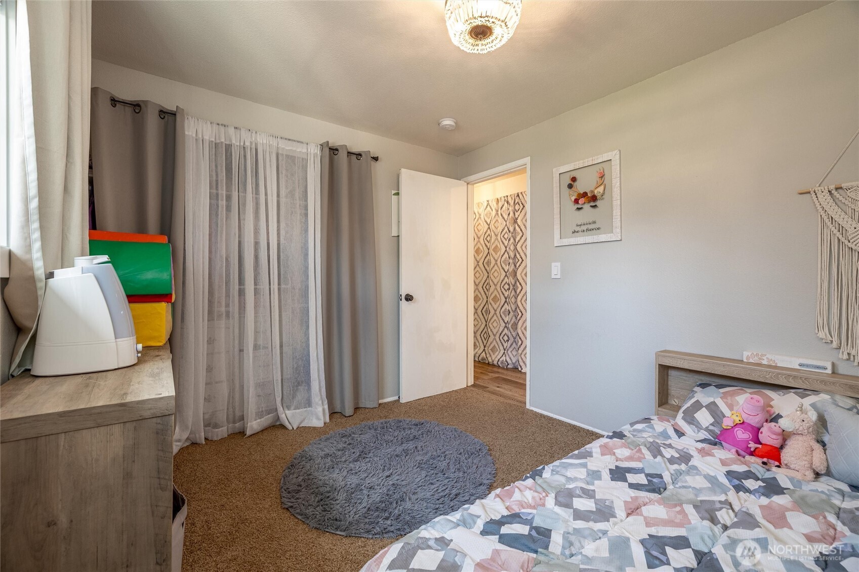 8679 Depot Road Lynden, WA 98264 - Photo 22 of 40 a bedroom with a bed and a window