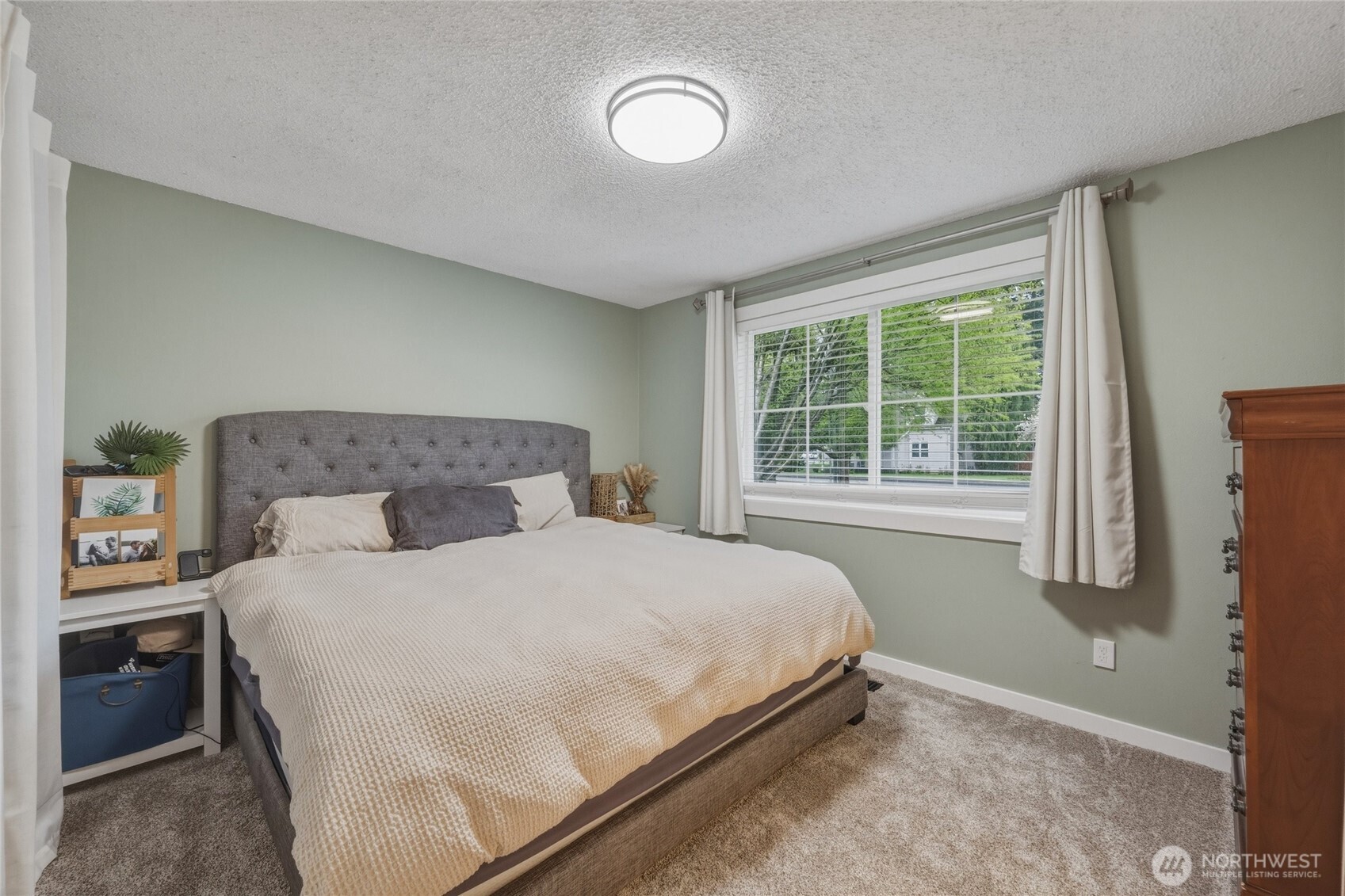 8679 Depot Road Lynden, WA 98264 - Photo 24 of 40 a bedroom with a bed and a window