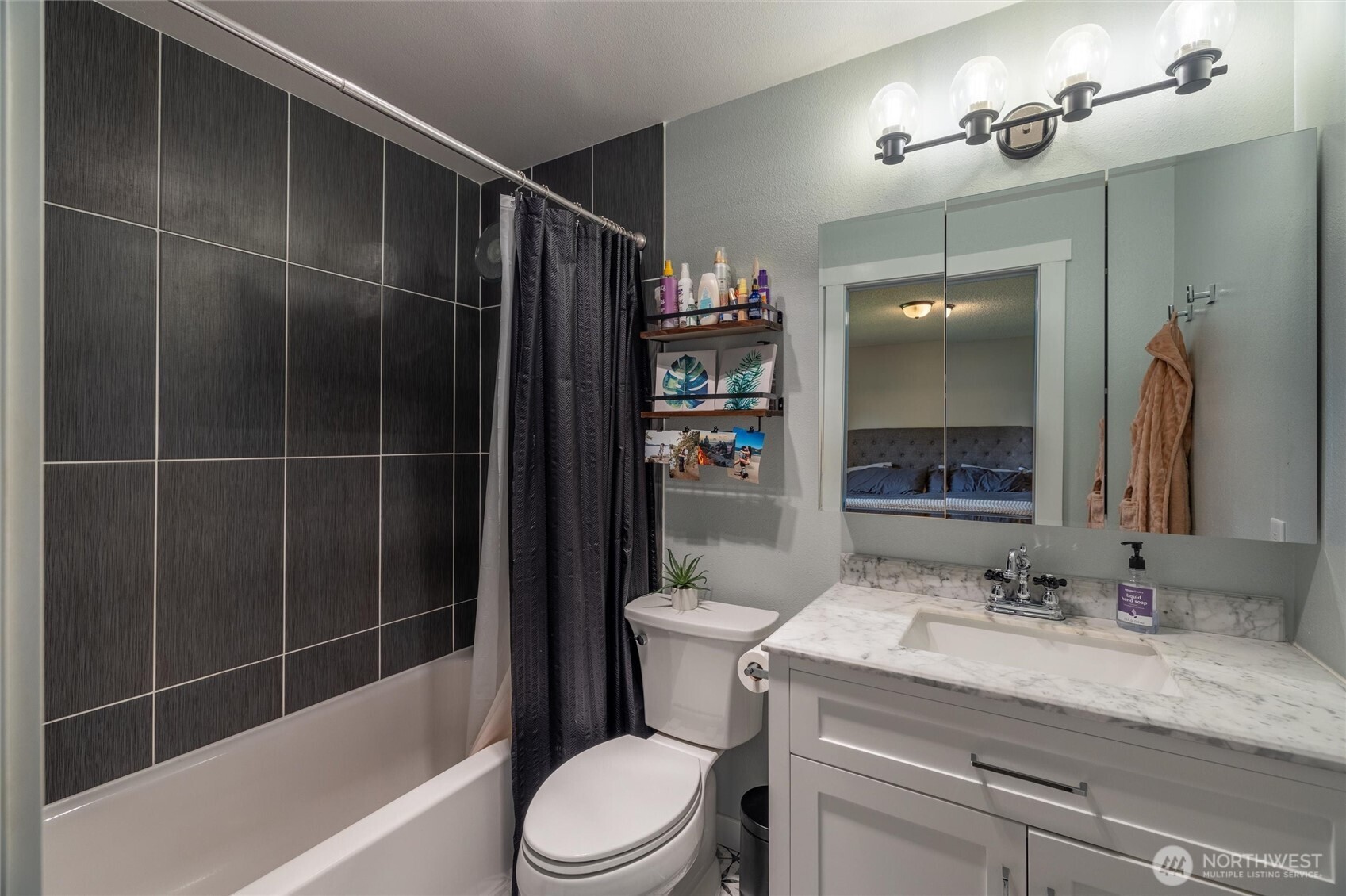 8679 Depot Road Lynden, WA 98264 - Photo 26 of 40 a bathroom with a granite countertop sink a toilet and shower