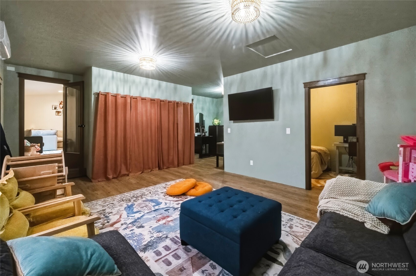 8679 Depot Road Lynden, WA 98264 - Photo 31 of 40 a bedroom with furniture and a flat screen tv