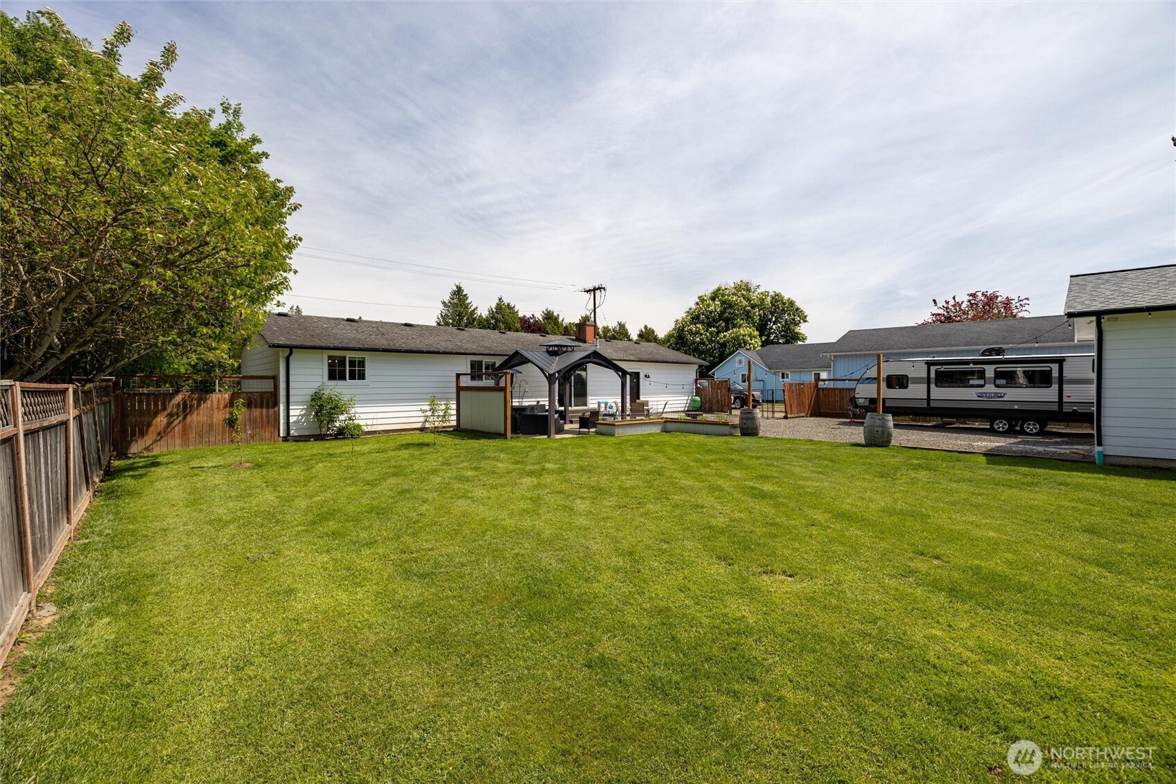 8679 Depot Road Lynden, WA 98264 - Photo 36 of 40 a front view of a house with a garden
