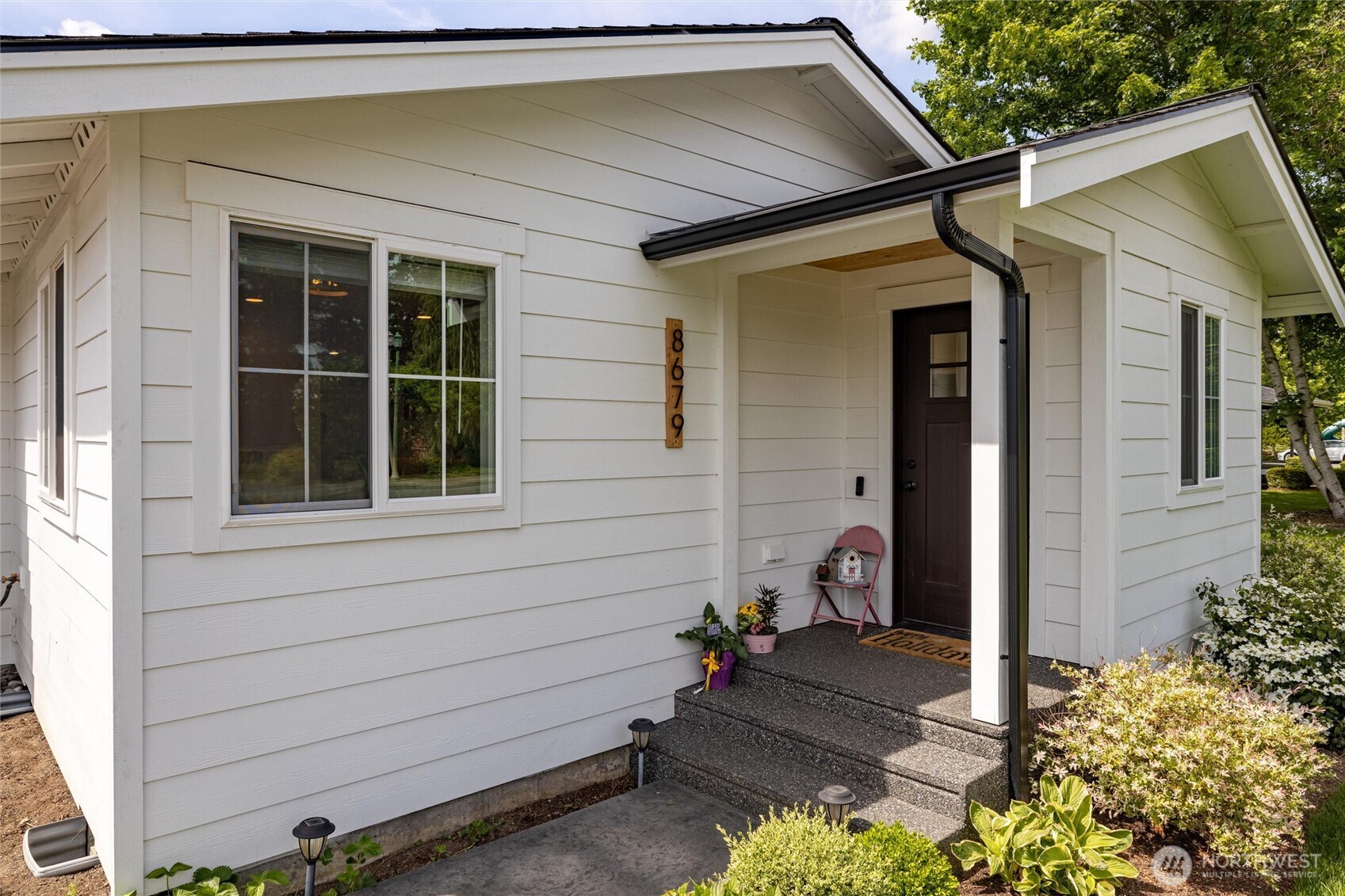 8679 Depot Road Lynden, WA 98264 - Photo 4 of 40 a view of a house with a backyard