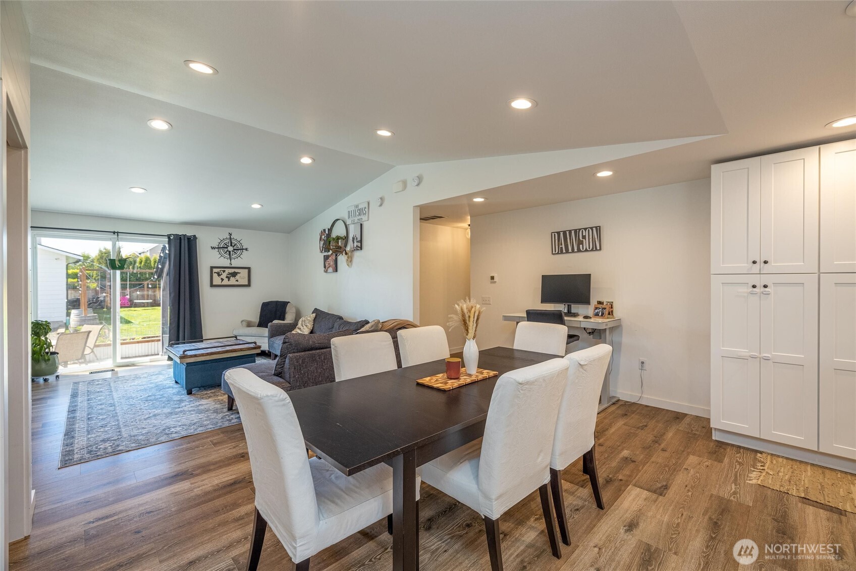 8679 Depot Road Lynden, WA 98264 - Photo 10 of 40 a view of a dining room with furniture and wooden floor