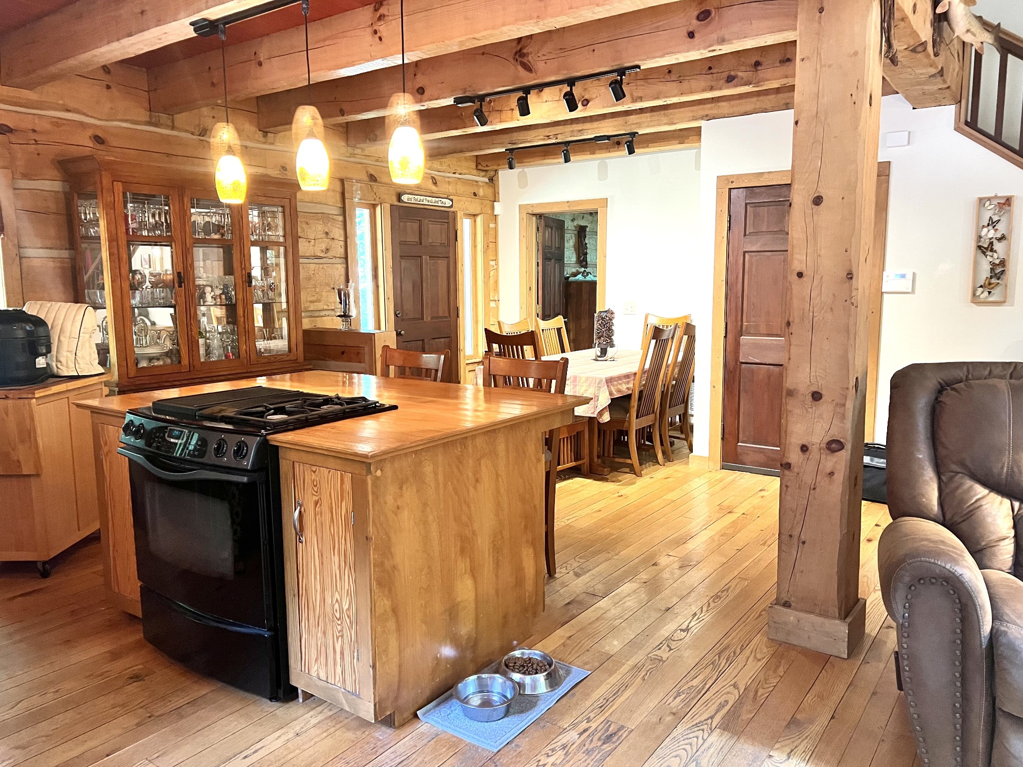 219 Freeland Road Portland, TN 37148 - Photo 13 of 53 a kitchen with stainless steel appliances granite countertop a stove and a dining table