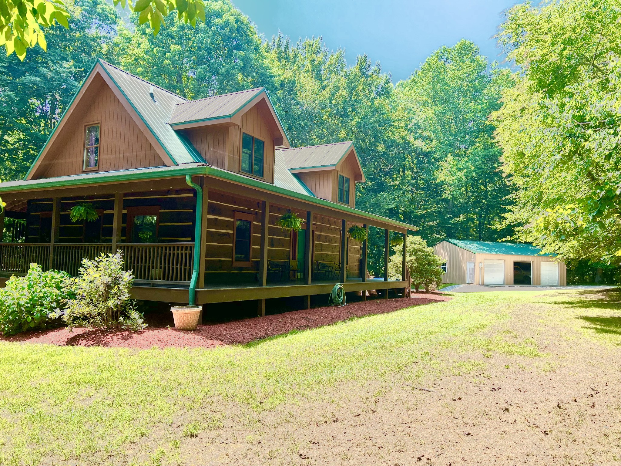 219 Freeland Road Portland, TN 37148 - Photo 3 of 53 a view of house with backyard and glass windows