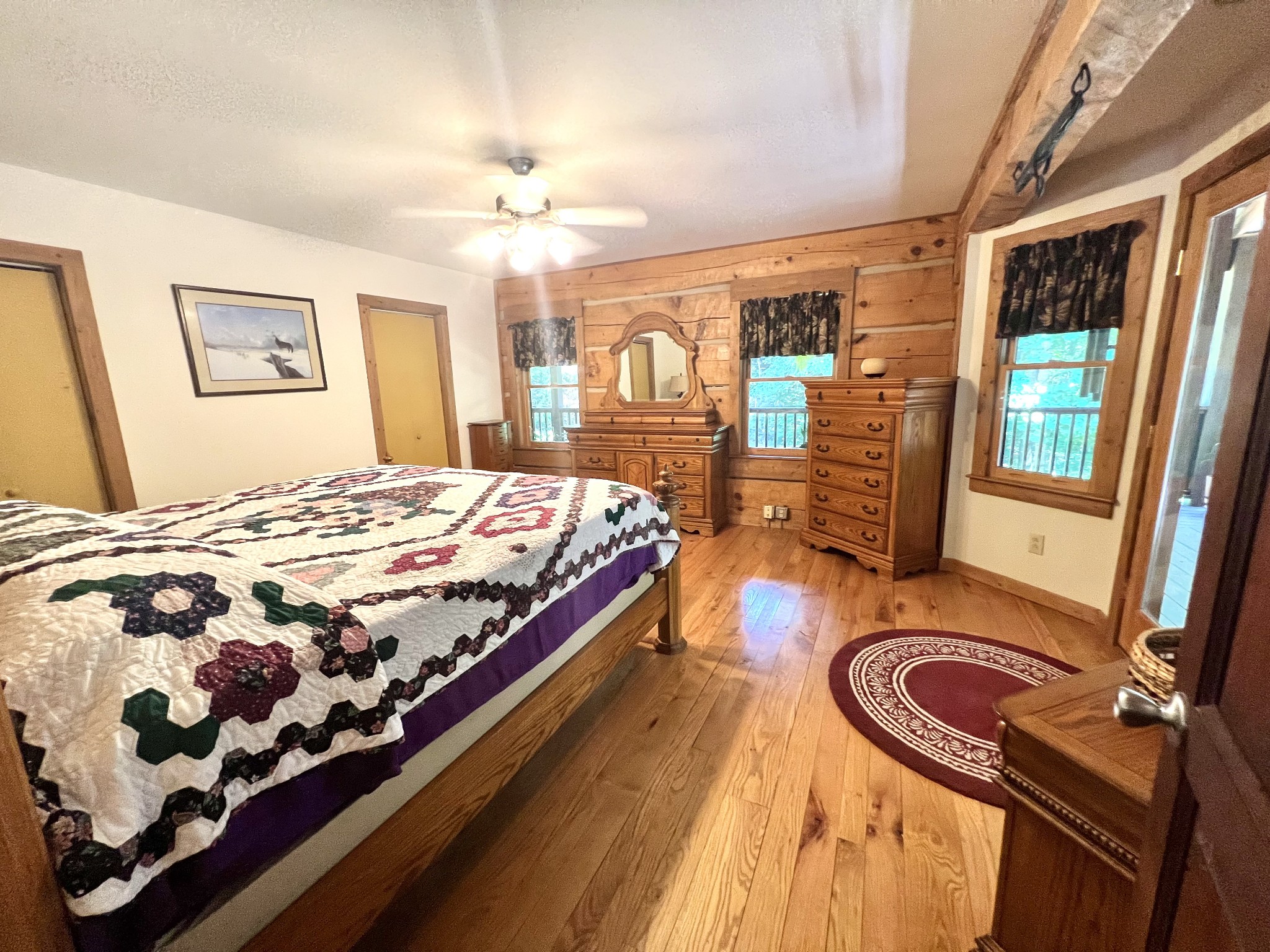 219 Freeland Road Portland, TN 37148 - Photo 36 of 53 a bedroom with a large bed and a dresser