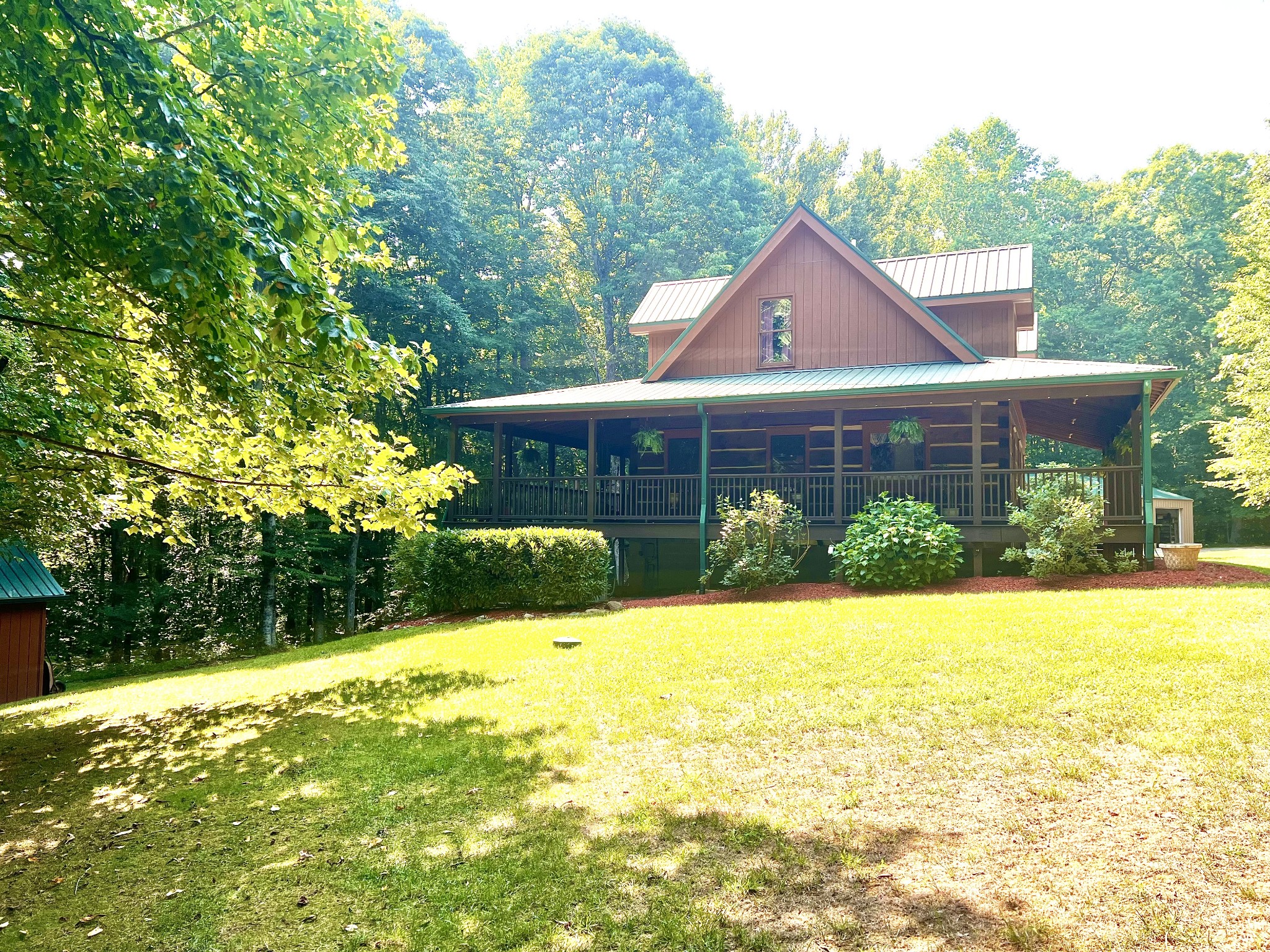 219 Freeland Road Portland, TN 37148 - Photo 4 of 53 a front view of a house with a yard