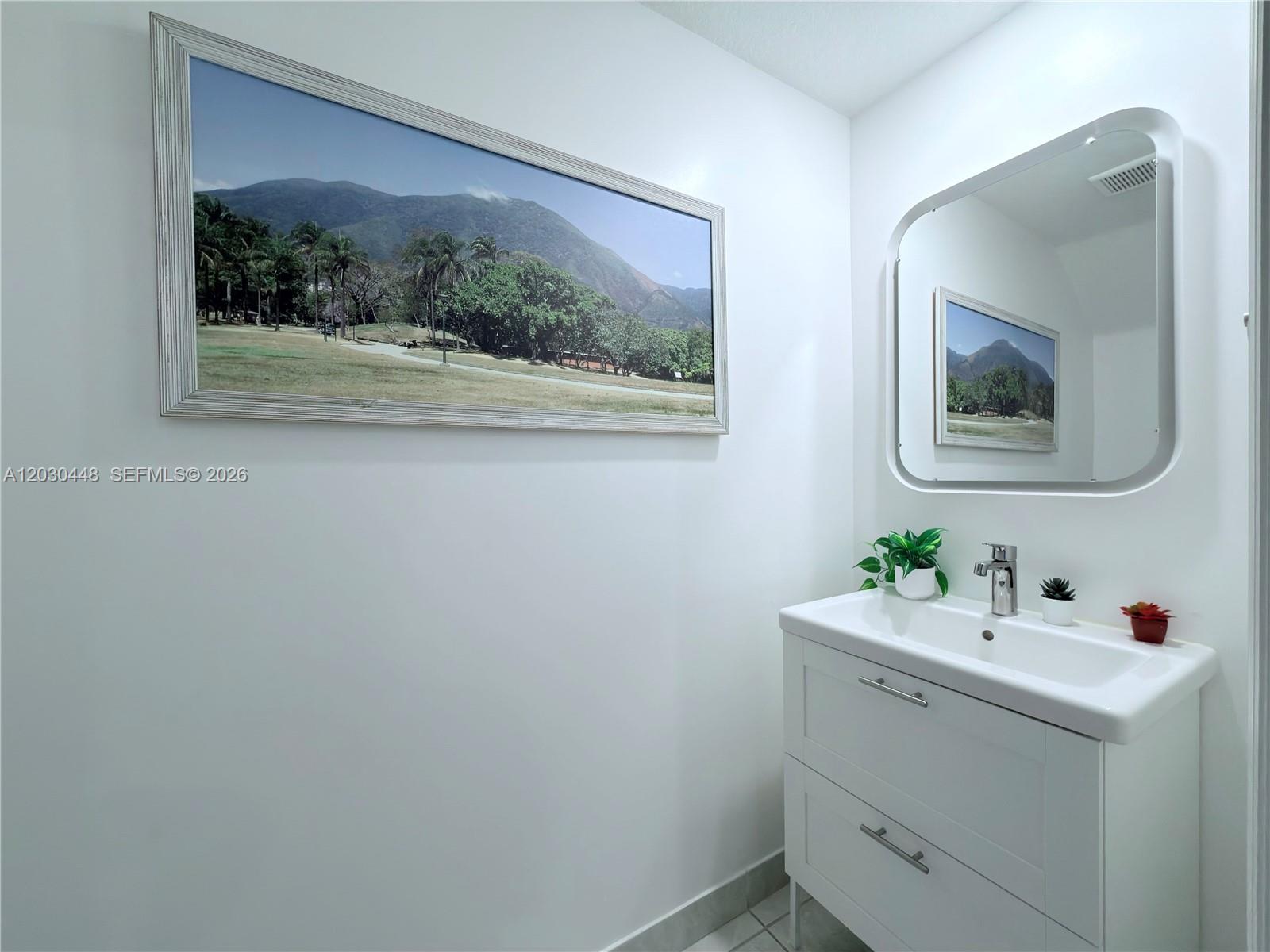20784 Northeast 5th Court, Unit 20784 Miami, FL 33179 - Photo 11 of 35 Half bathroom downstairs.