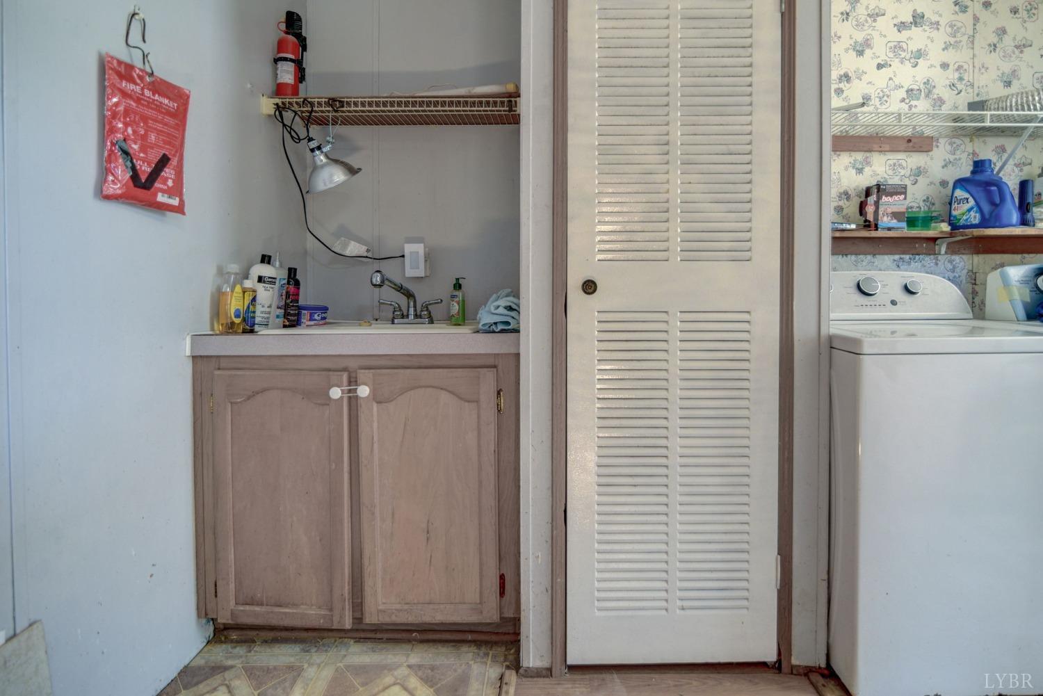 349 Theta Mill Road Gladys, VA 24554 - Photo 11 of 48 a view of hallway with washer and dryer