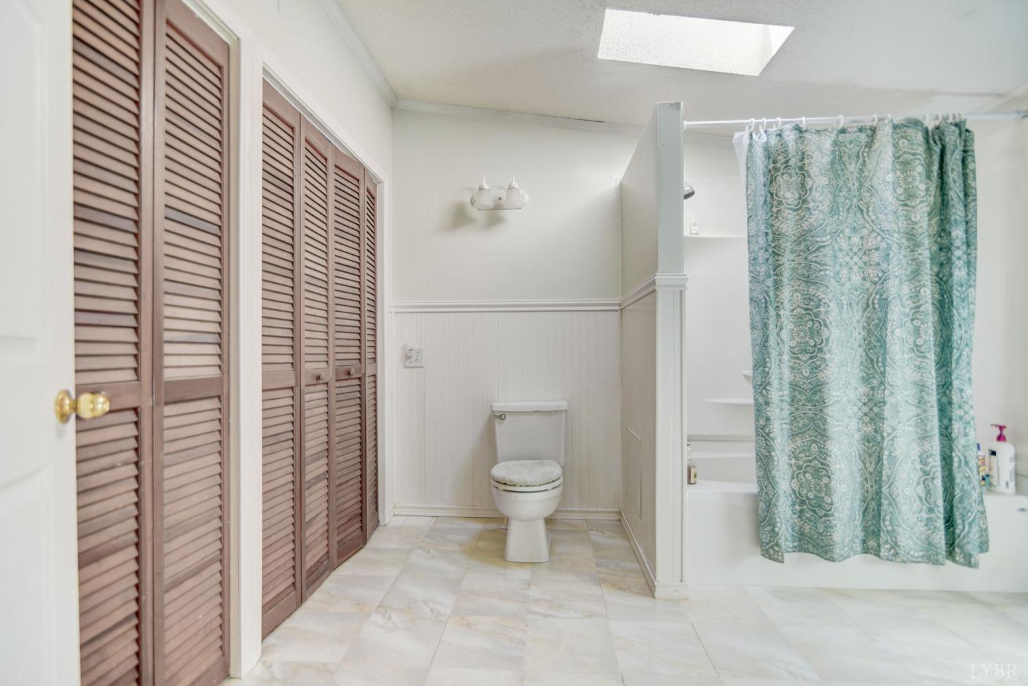 349 Theta Mill Road Gladys, VA 24554 - Photo 15 of 48 a bathroom with a toilet and a shower
