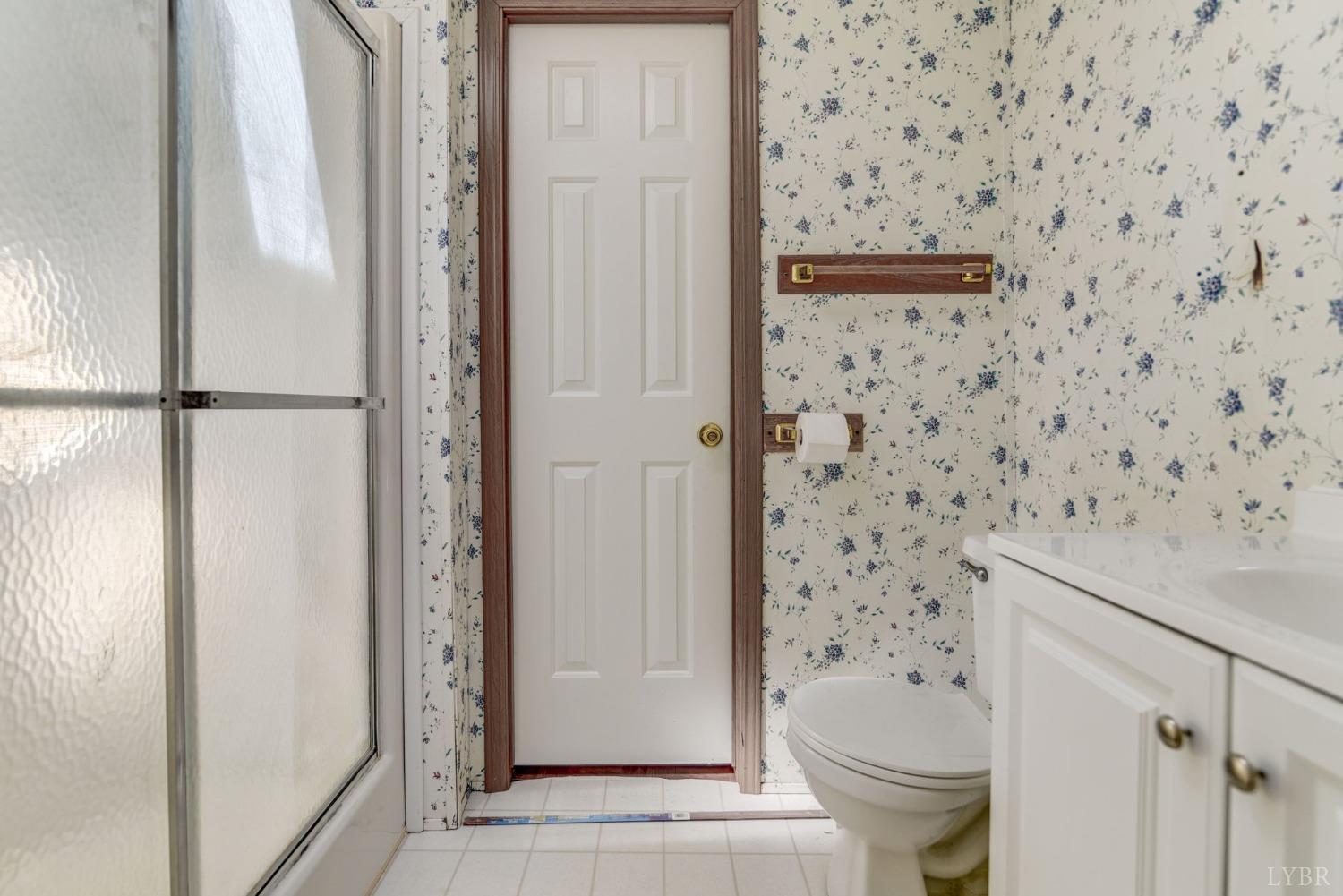 349 Theta Mill Road Gladys, VA 24554 - Photo 26 of 48 a bathroom with a toilet and a shower