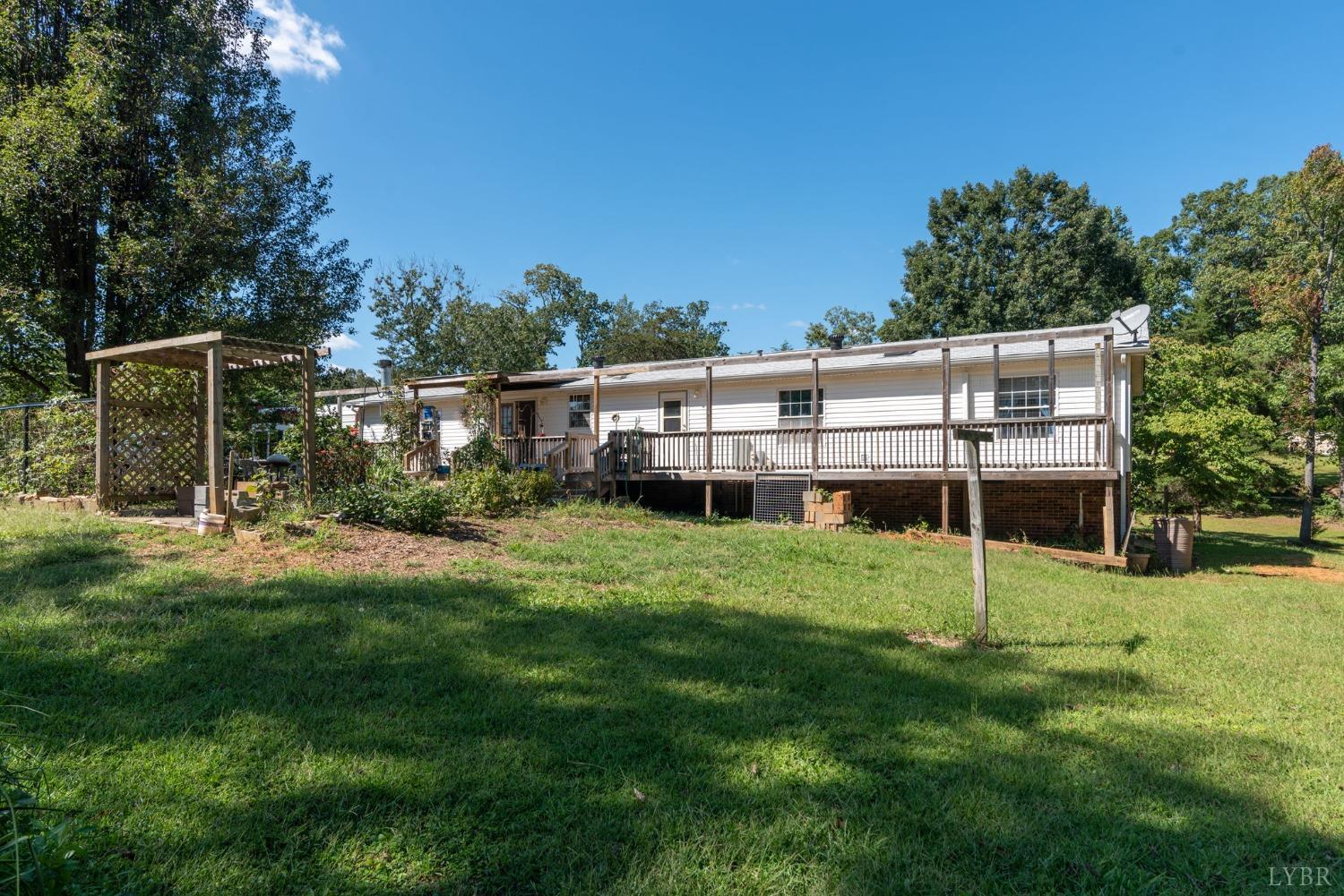 349 Theta Mill Road Gladys, VA 24554 - Photo 29 of 48 a view of a house with backyard and sitting area