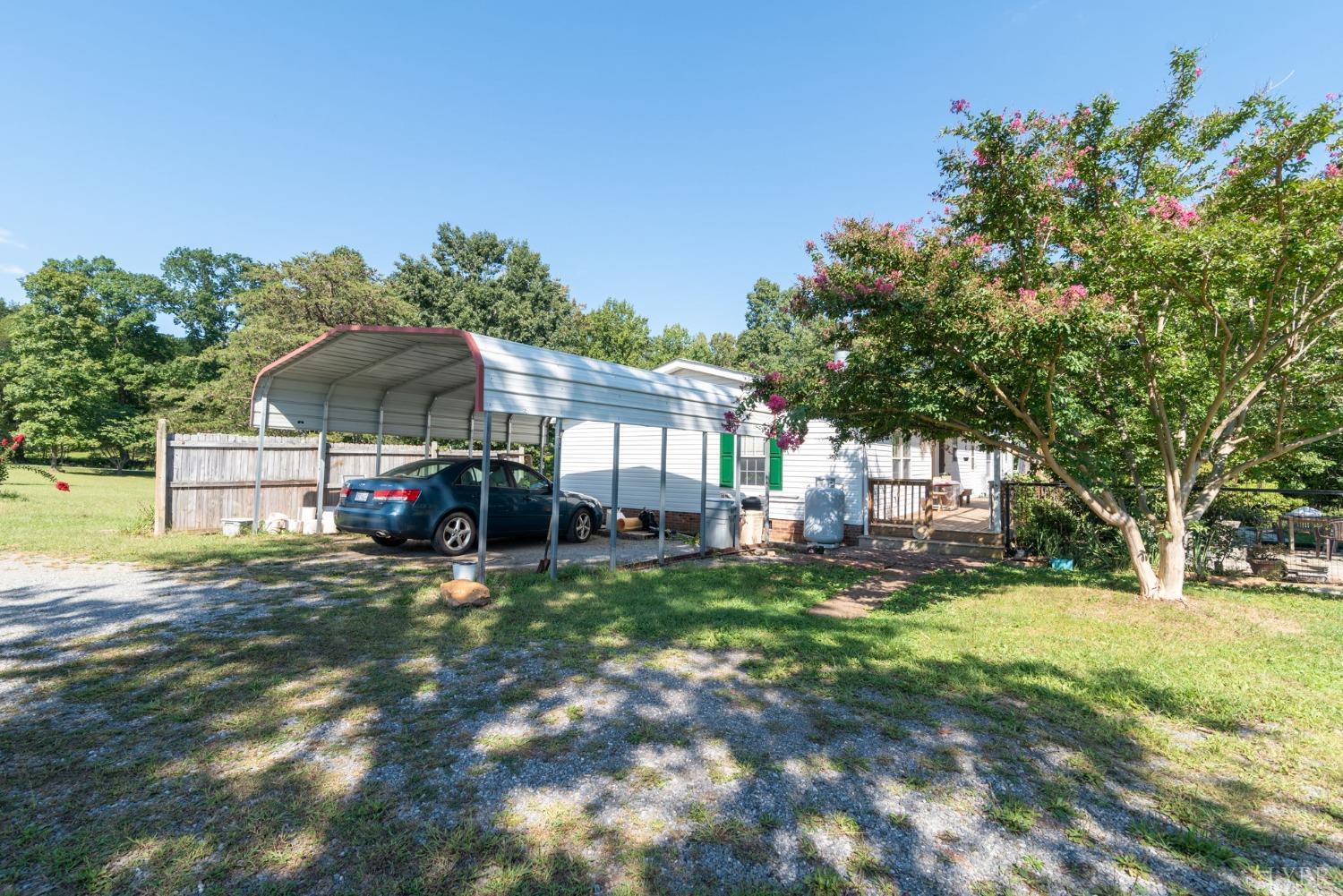 349 Theta Mill Road Gladys, VA 24554 - Photo 42 of 48 a view of a house with a yard