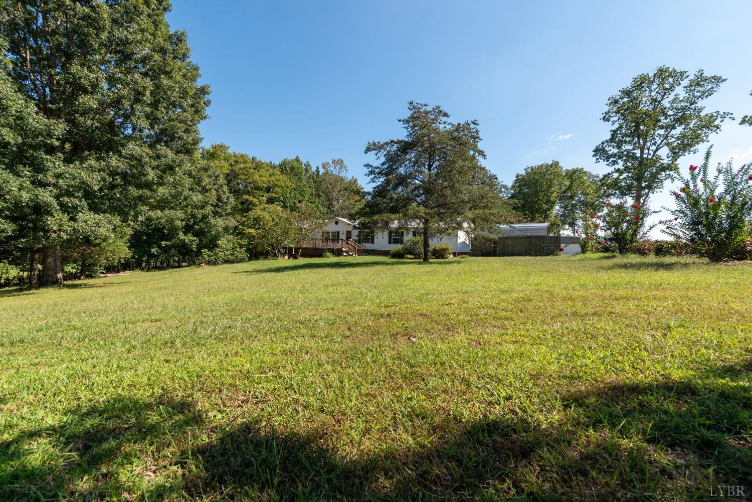 349 Theta Mill Road Gladys, VA 24554 - Photo 48 of 48 a view of a swimming pool and trees in the background