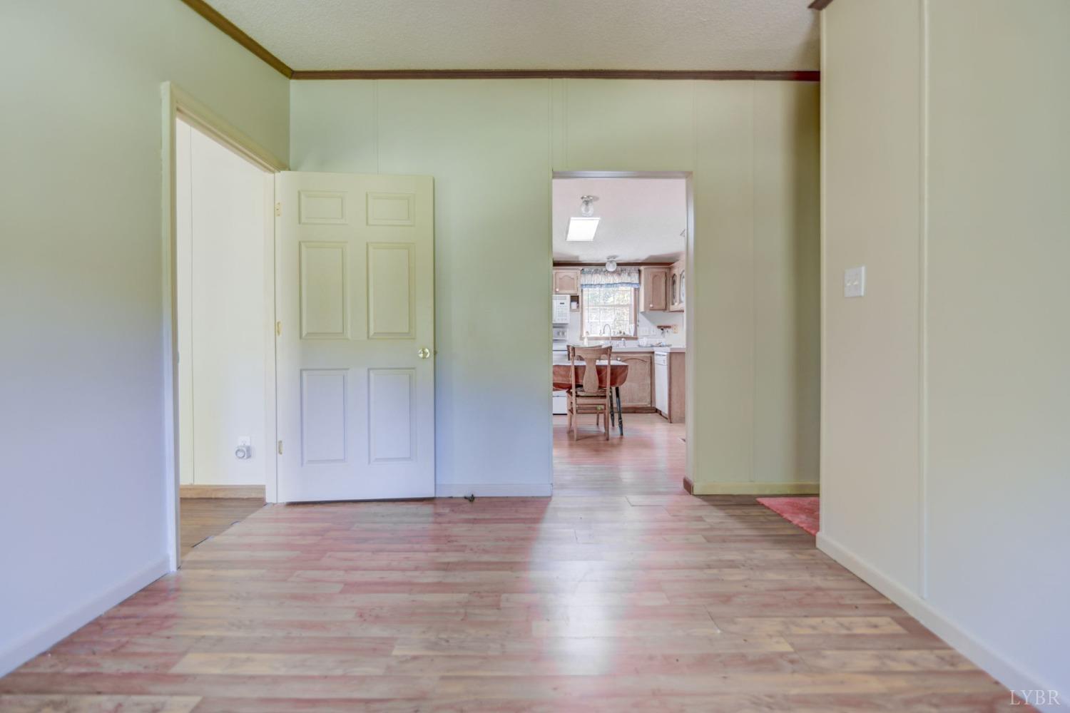 349 Theta Mill Road Gladys, VA 24554 - Photo 6 of 48 a view of empty room with wooden floor