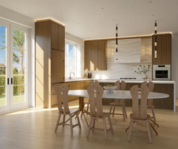 a kitchen with stainless steel appliances granite countertop a sink and a refrigerator