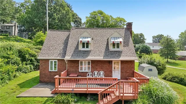 a view of a house with a roof deck