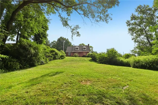 a view of a garden with an outdoor space