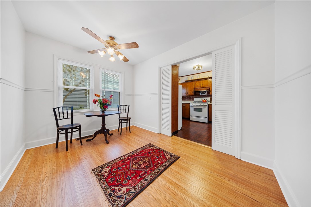 97 Vinton Road Irondequoit, NY 14622 - Photo 10 of 49 SPACIOUS DINING ROOM WITH NEWLY FINISHED HARDWOOD FLOORS