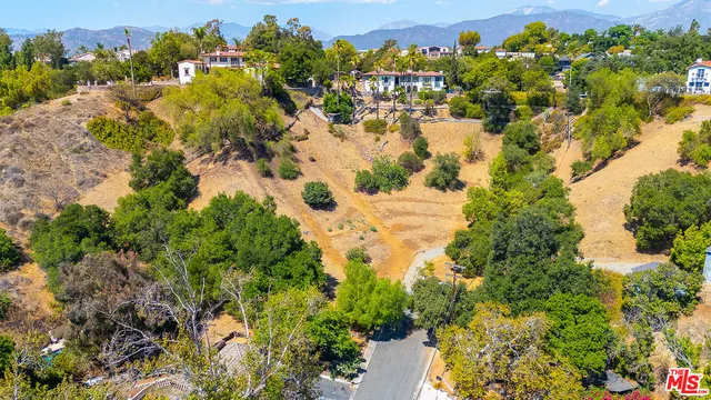 a view of a houses with a lake view