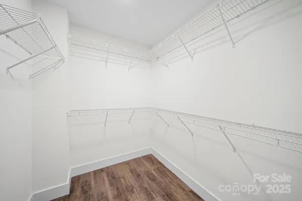 a view of a room with racks on the wall