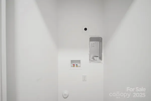 a view of room with air conditioner and window