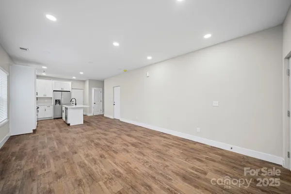 a view of a kitchen with a sink