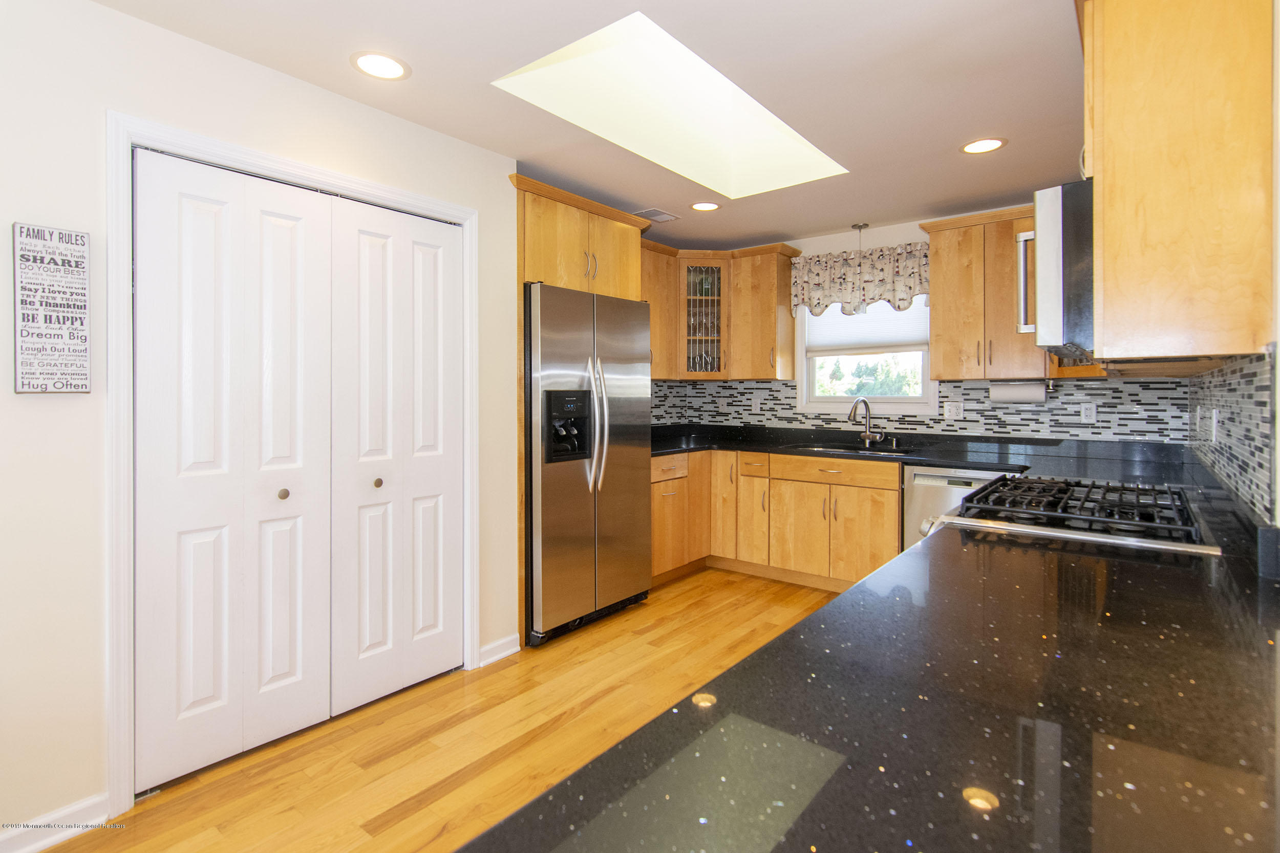 20 Holiday Road Seaside Heights, NJ 08751 - Photo 11 of 42 a view of a kitchen with kitchen island a large window in it