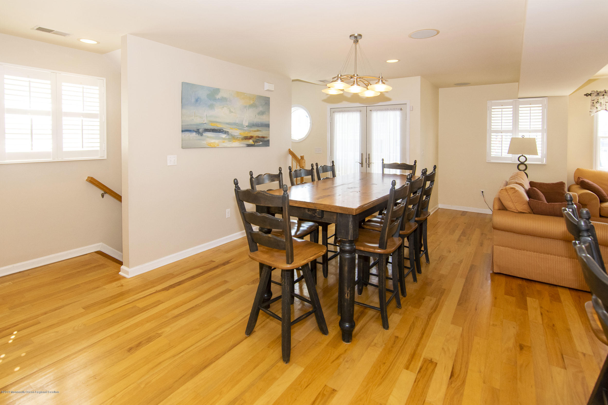 20 Holiday Road Seaside Heights, NJ 08751 - Photo 17 of 42 a view of a dining room with furniture and wooden floor