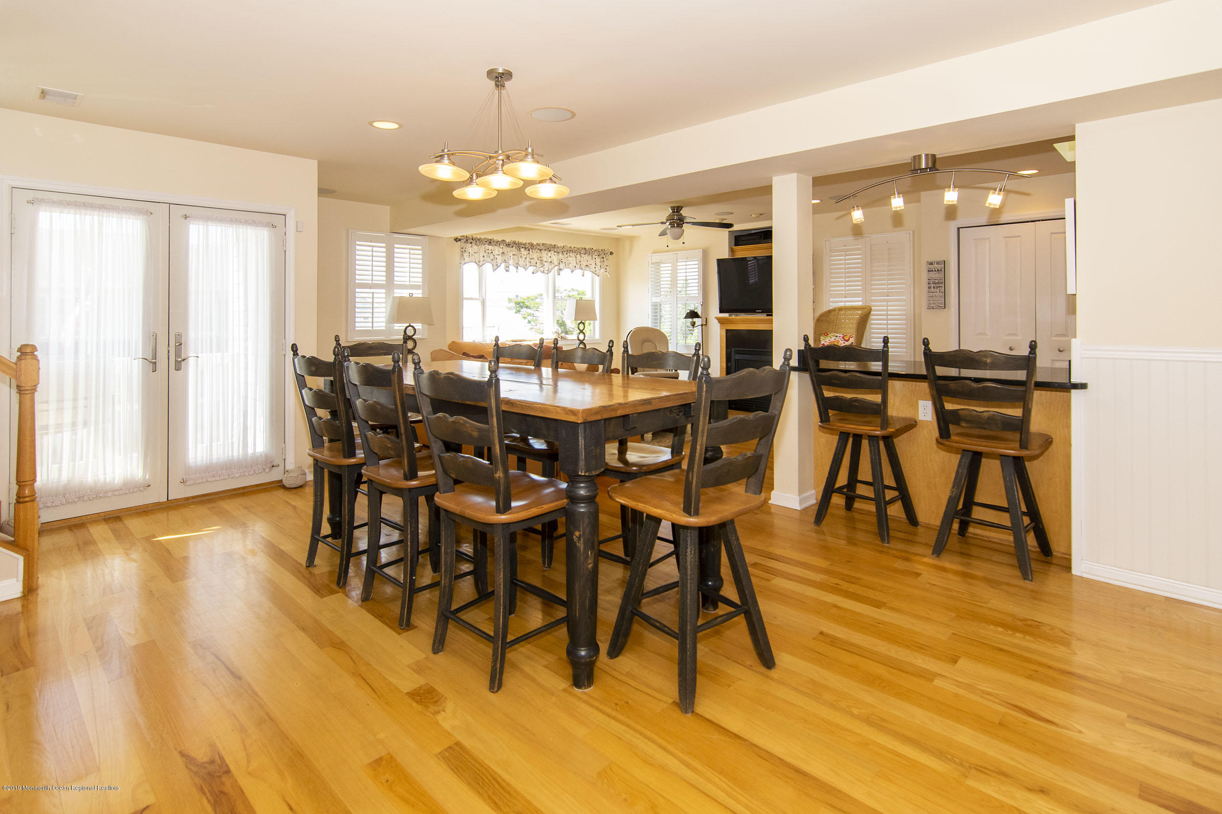 20 Holiday Road Seaside Heights, NJ 08751 - Photo 19 of 42 a view of a dining room with furniture and wooden floor