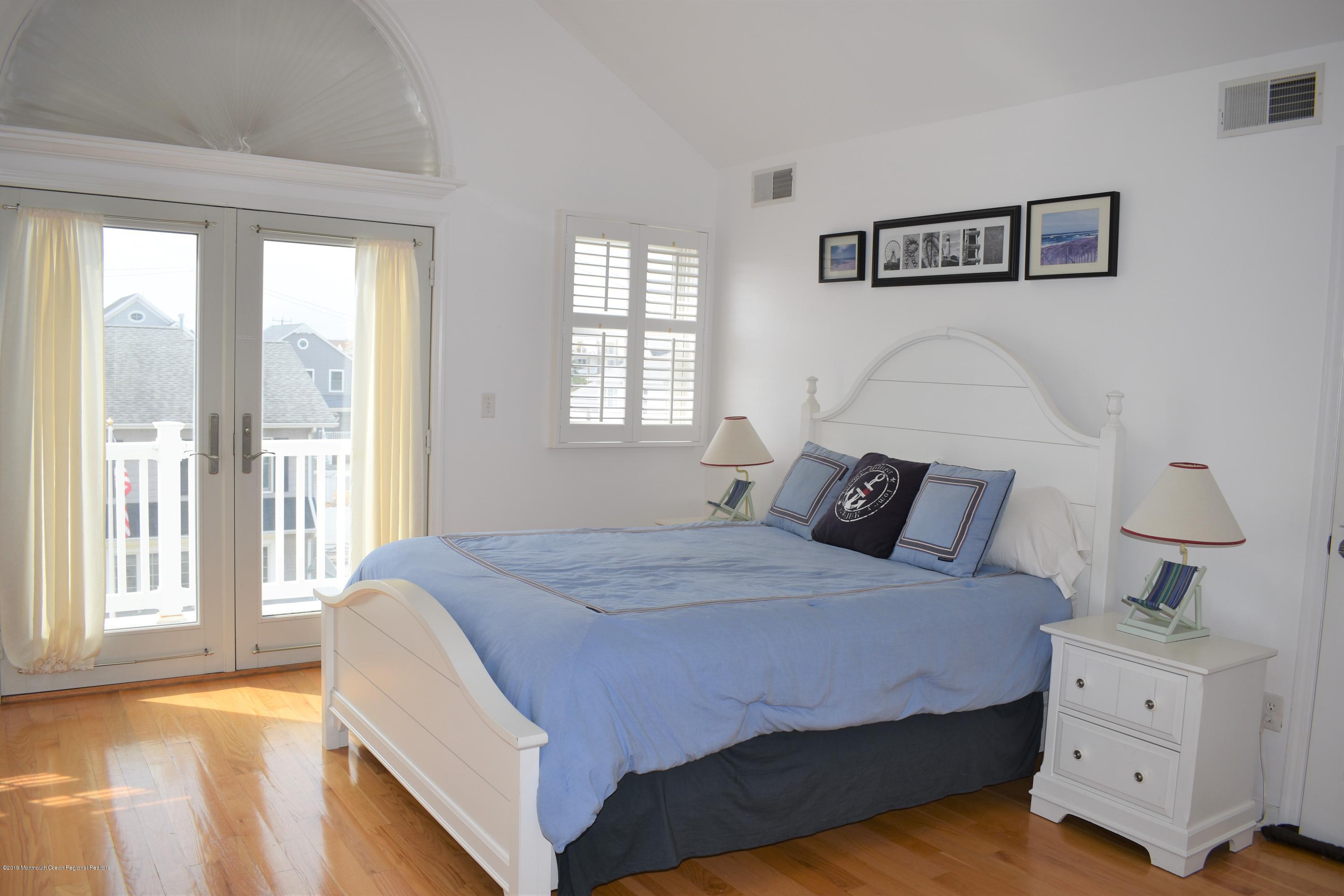 20 Holiday Road Seaside Heights, NJ 08751 - Photo 22 of 42 a bedroom with a bed and window
