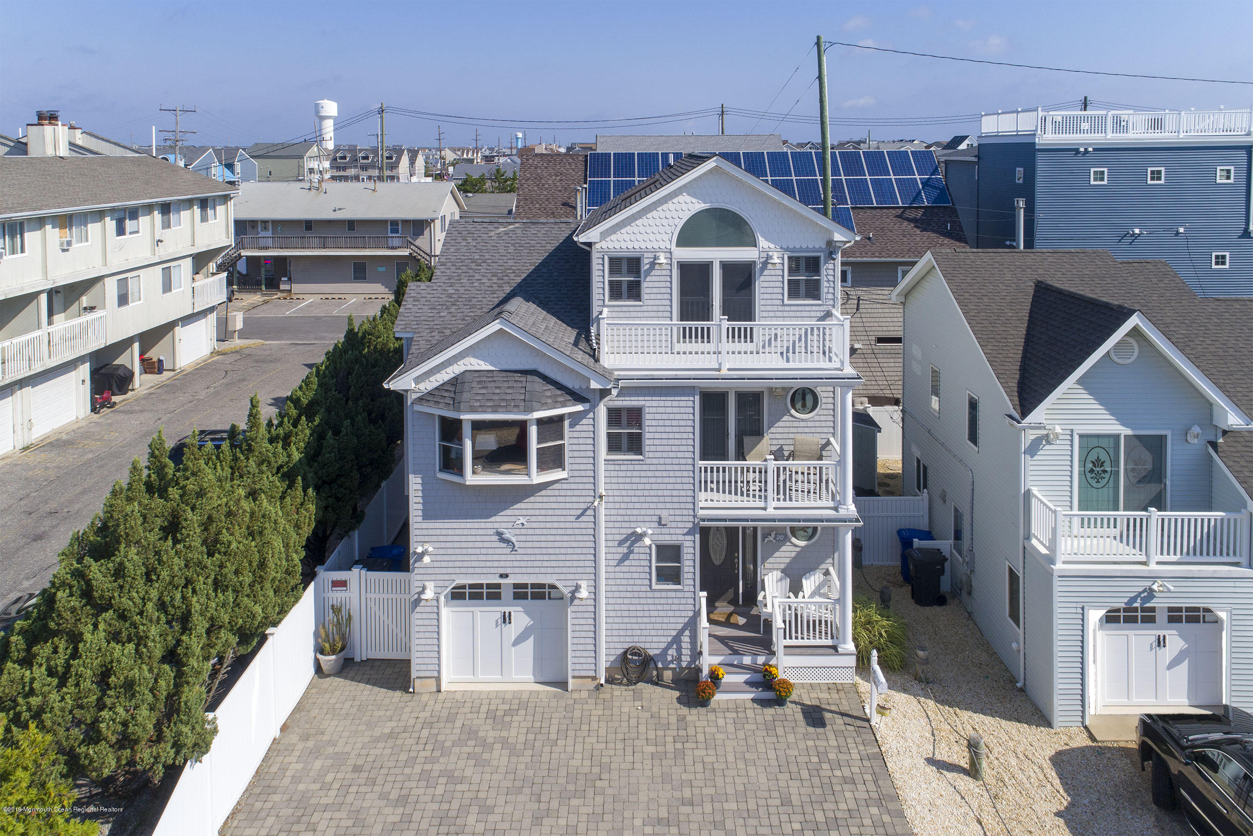20 Holiday Road Seaside Heights, NJ 08751 - Photo 3 of 42 a front view of a house with a yard