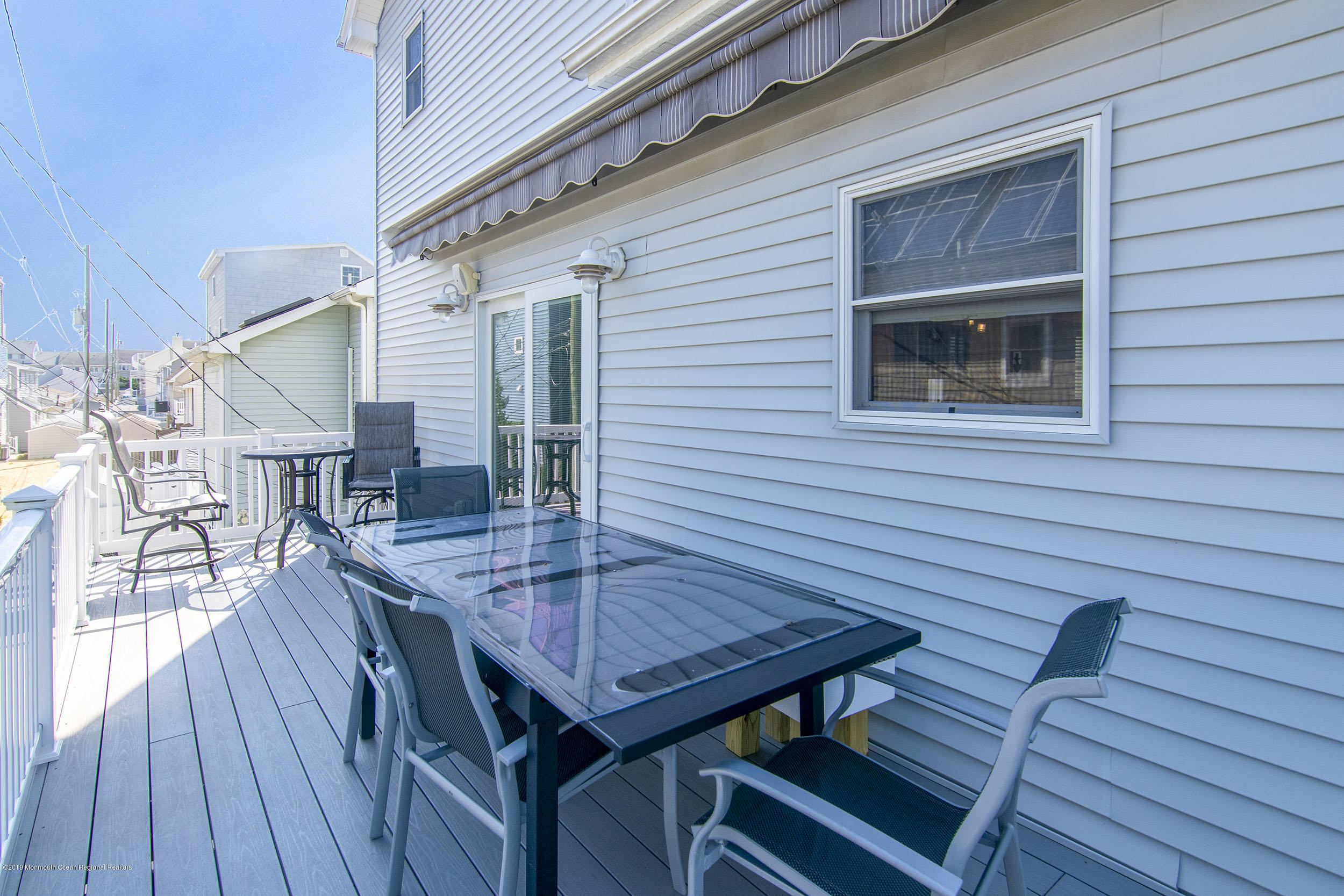 20 Holiday Road Seaside Heights, NJ 08751 - Photo 36 of 42 a dinning table and chairs in wooden floor