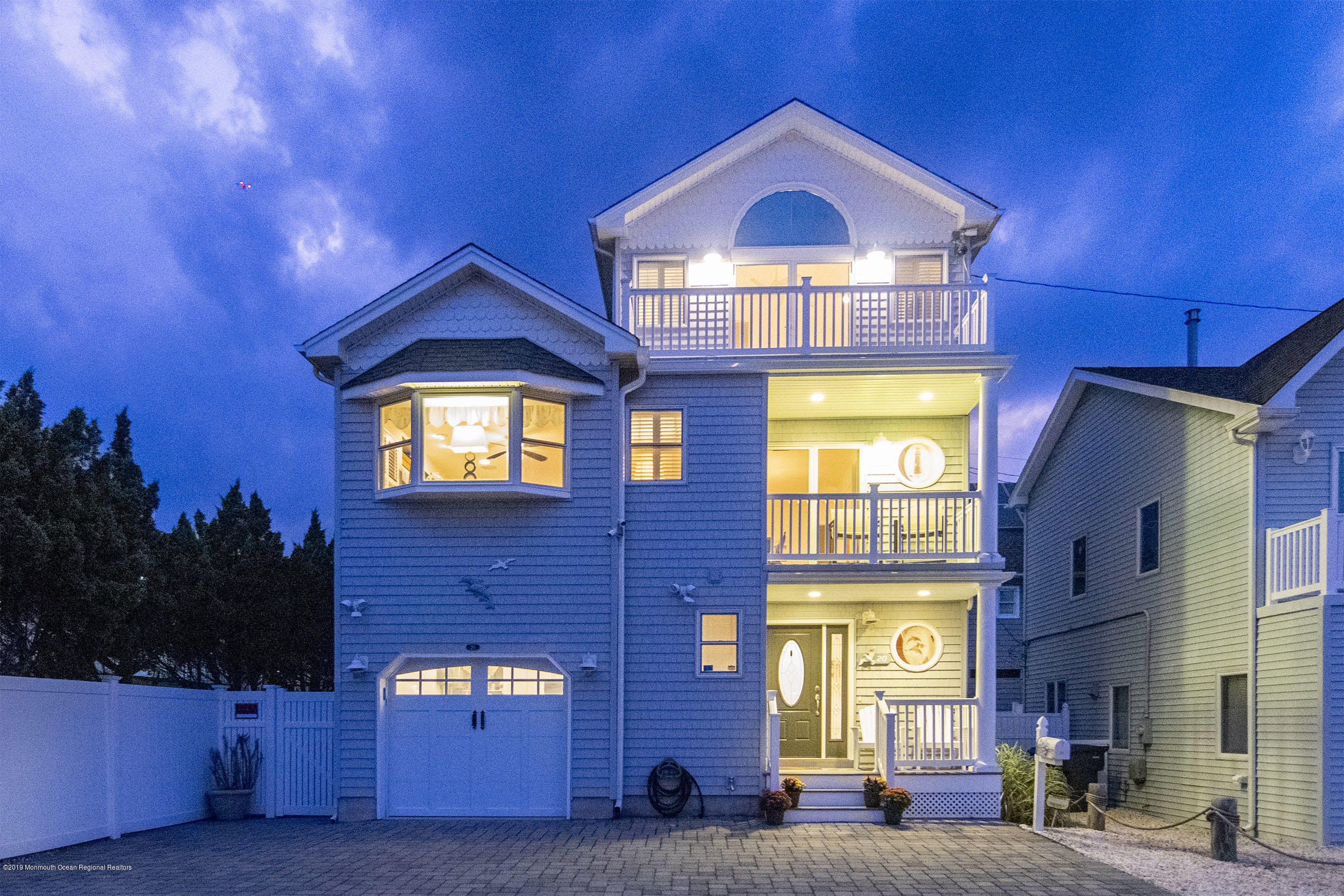 20 Holiday Road Seaside Heights, NJ 08751 - Photo 4 of 42 a front view of a house with a yard
