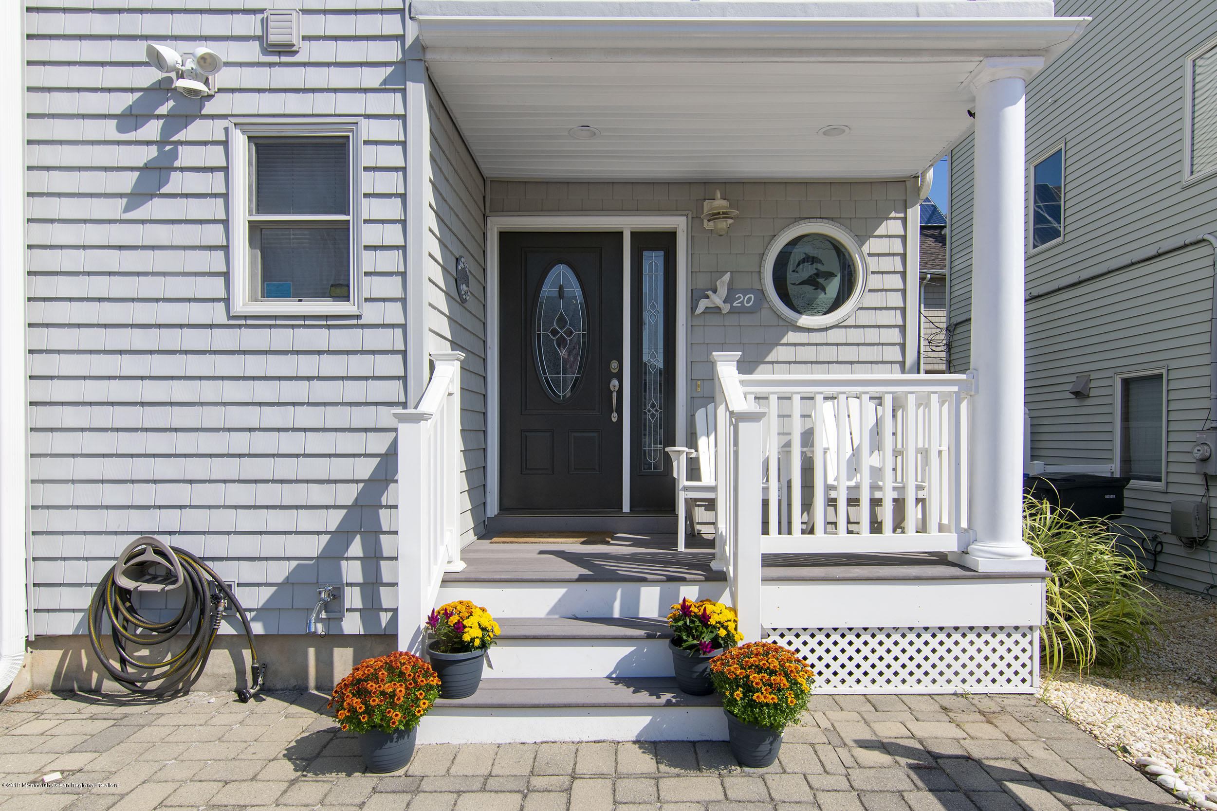 20 Holiday Road Seaside Heights, NJ 08751 - Photo 8 of 42 a front view of a house with outdoor seating