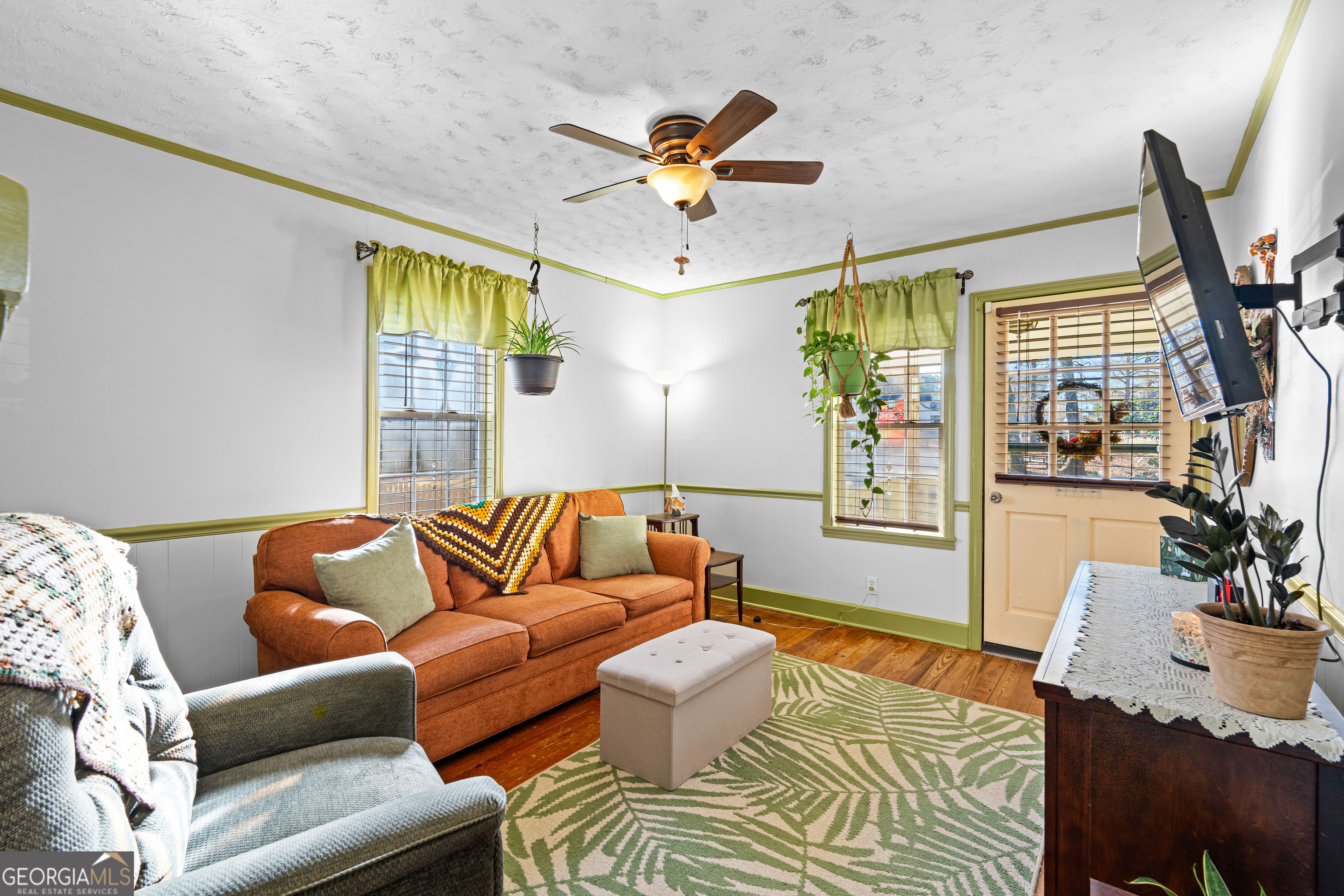 209 Boogers Hill Road Oxford, GA 30054 - Photo 17 of 44 a living room with furniture and a large window