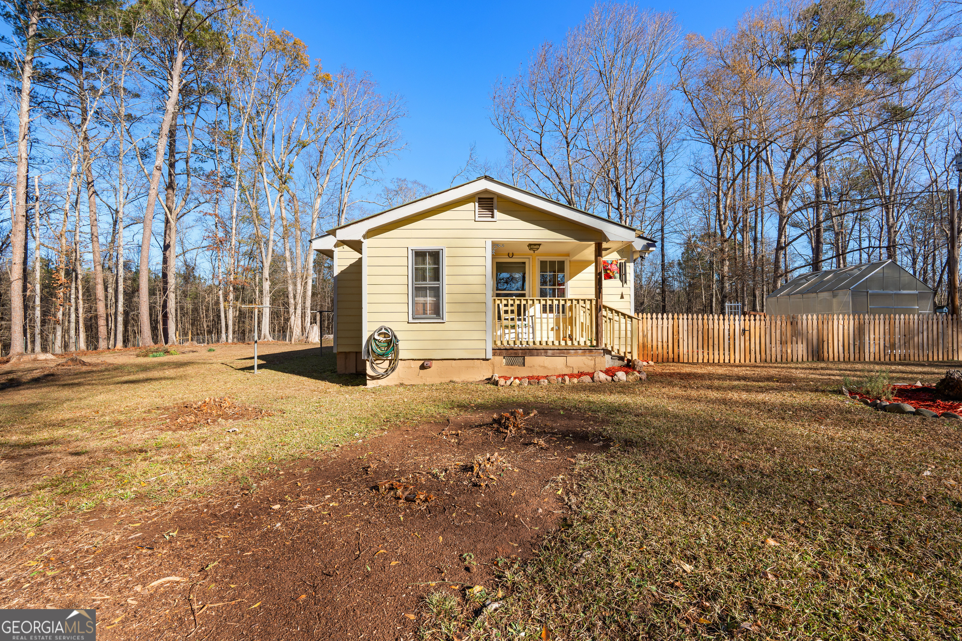 209 Boogers Hill Road Oxford, GA 30054 - Photo 2 of 44 a front view of a house with a yard